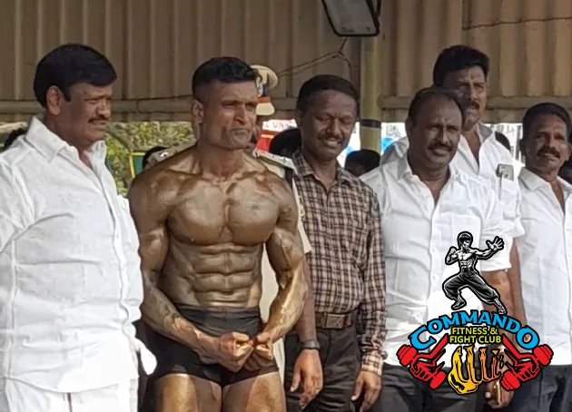 Master Kannan receiving an award for his achievements in martial arts